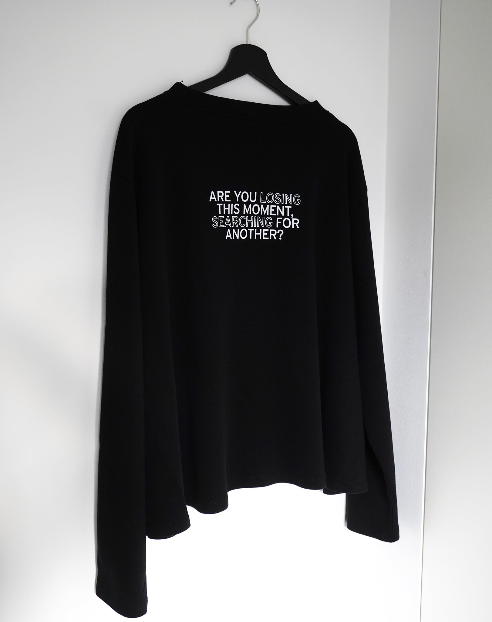 Are you losing this moment, searching for another? Black Flowy Long Sleeve - OBLIVIOUS?