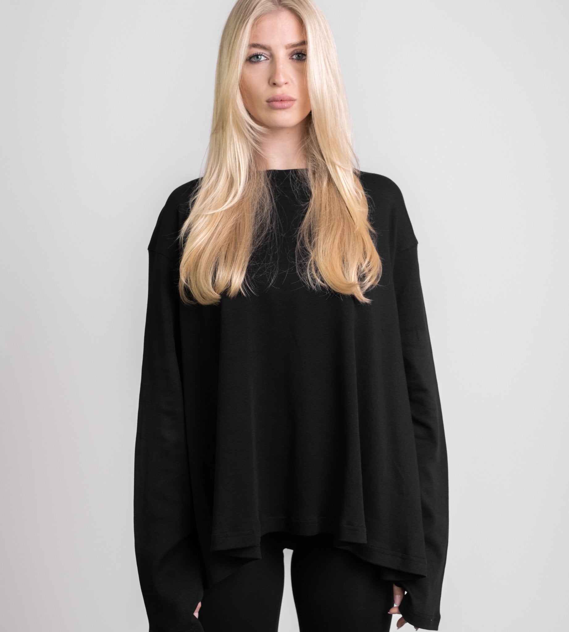 Are you losing this moment, searching for another? Black Flowy Long Sleeve - OBLIVIOUS?