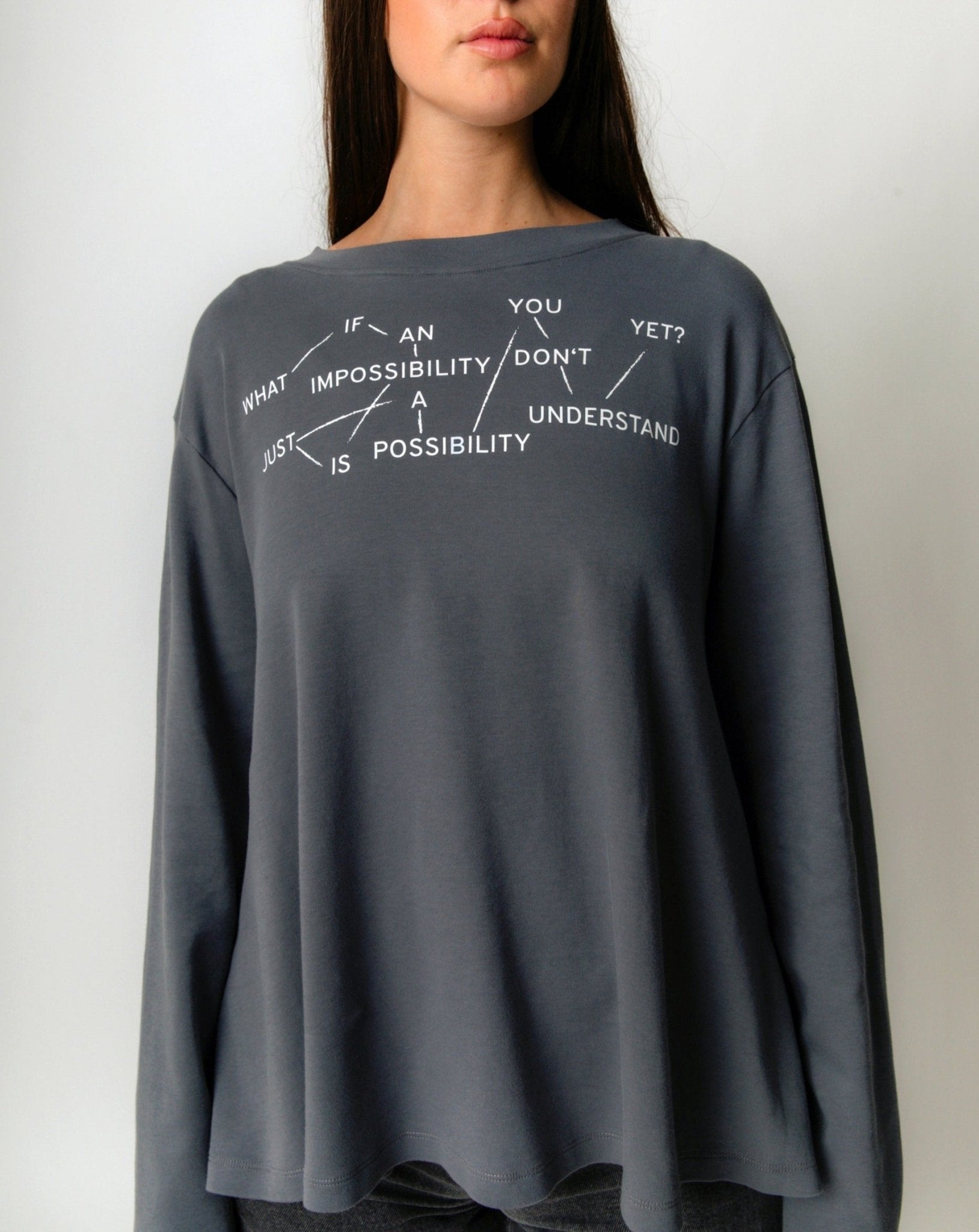 What if an impossibility is just a possibility you don't understand yet? Flowy Long Sleeve - OBLIVIOUS?